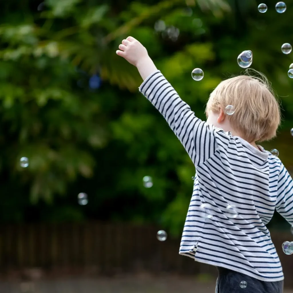Kid Blowing Bubbles