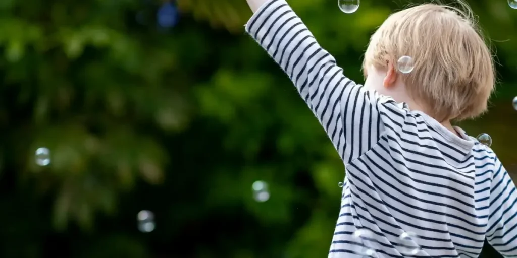 Kid Blowing Bubbles